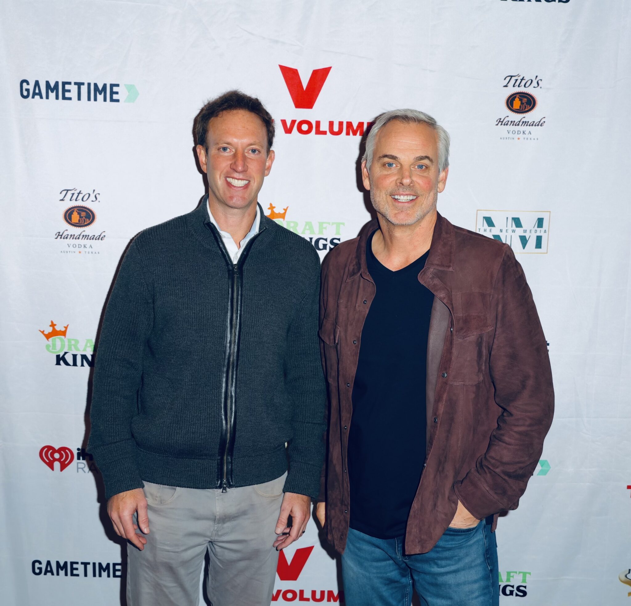 Jamie Horowitz posing with sports commentator Colin Cowherd at The Volume Super Bowl Party 2024.